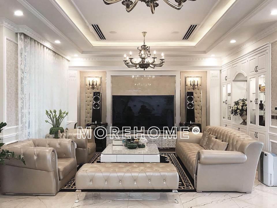 Kết hợp với mảng tường lớn để tivi và giàn loa đài được ốp da tạo sự sang trọng cho căn phòng Mẫu thiết kế và thi công nội thất biệt thự