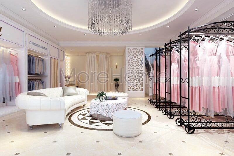 Mẫu thiết kế sofa bọc da tân cổ điển màu trắng sang trọng tạo điểm nhấn nổi bật cho showroom áo cưới thêm sang trọng, lộng lẫy